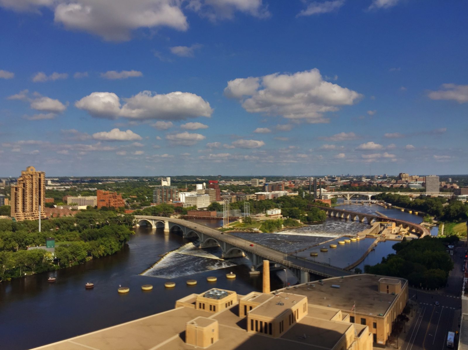 The Stone Arch Bridge, the lock, and the mill district from above